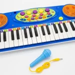 Organeta piano carita micrófono para niño juguete