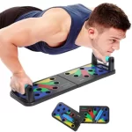 Hombre haciendo ejercicios en la Tabla de flexiones push up 9 en 1