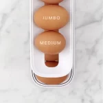 Dispensador y organizador de huevos rotativo 3