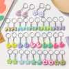 Llaveros Coloridos con Flores y Lazos en PVC Pack x12 uds