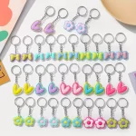Llaveros Coloridos con Flores y Lazos en PVC Pack x12 uds