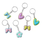 Llaveros Coloridos con Flores y Lazos en PVC Pack x12 uds