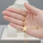 Juego de collar y Aretes Estrellas