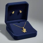 Juego de collar y Aretes Gato Dorado